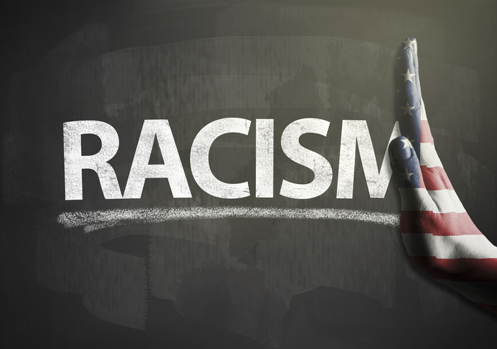 Stop hands sign with USA flag and RACISM / Flag blackboard concept (Click for more)