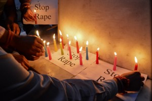 People Using Candles in a Protest Against Rapes in India