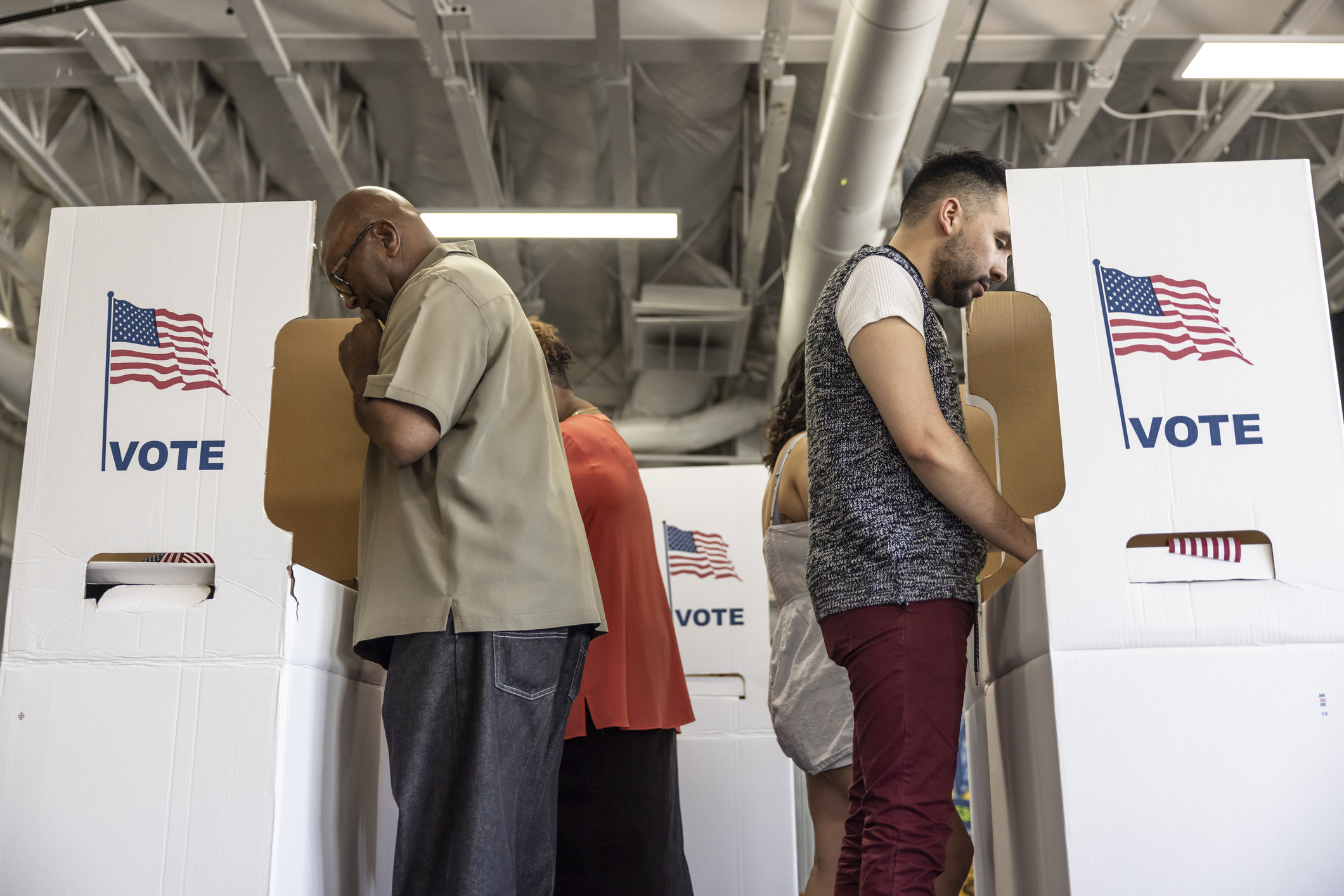 People voting at a community center