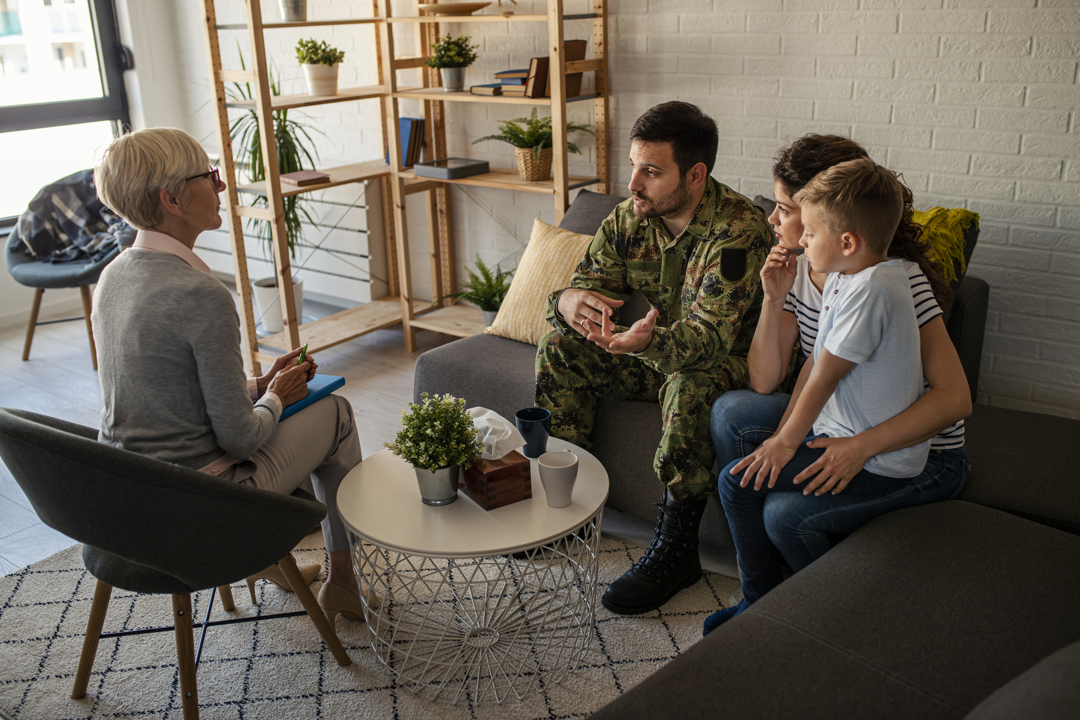 a soldier and his family meet with a social worker