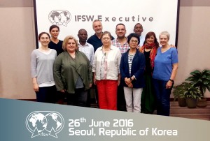 NASW President Darrell Wheeler, back row at right, stands with the newly elected IFSW Executive Committee. 