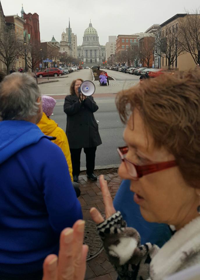 NASW Foundation Pioneer Linda Grobman, editor and publisher of The New Social Worker Magazine, speaks at Harrisburg, Pa. march.