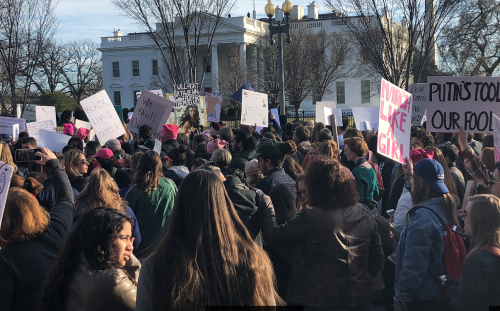March participants gather in front of the White House. Photo by Mel Wilson.