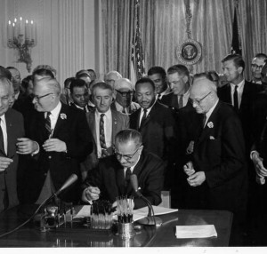 President Johnson signs the Civil Rights Act into law. Photo courtesy of www.learnnc.org.